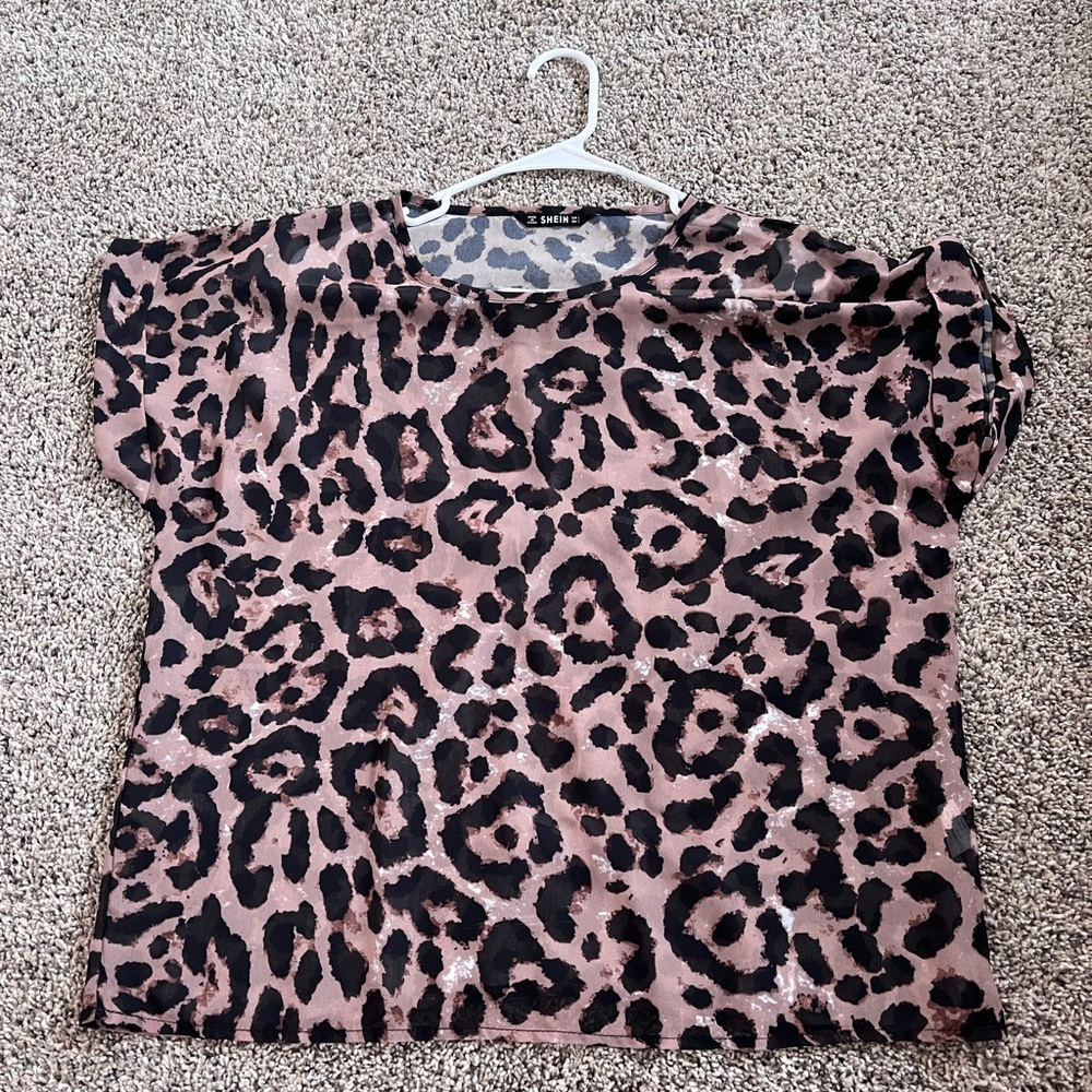 Brown and black see through cheetah shirt never worn